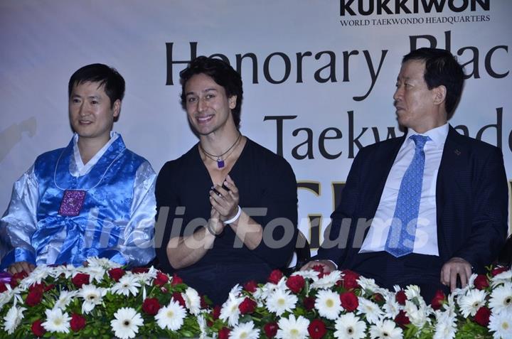 Tiger Shroff gives a smiling pose for the camera