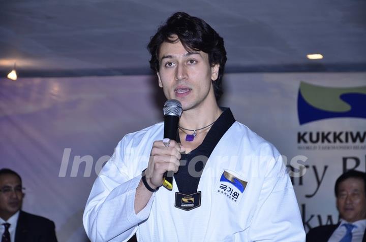 Tiger Shroff addressing the audience at the Kukkiwon Award Ceremony