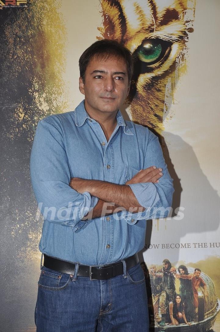 Kamal Saldanah poses for the media at Roar Film Launch