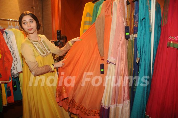 Sasha Agha checksout the collection at the Inaugration of Fashion Apparel Label Zinnia