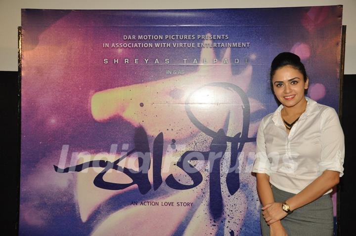 Amruta Khanvilkar poses with the poster of Baji at the First Look Launch