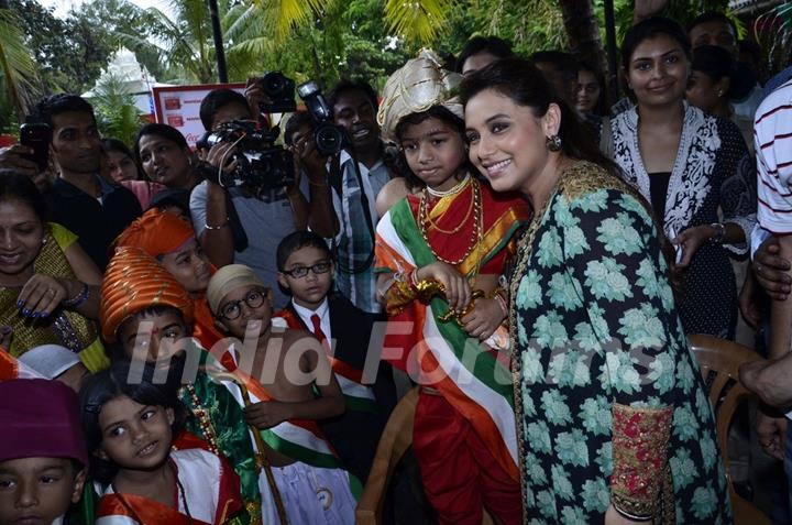 Rani Mukherjee poses with fancy dressed students at the Promotion of Mardaani at a Local School