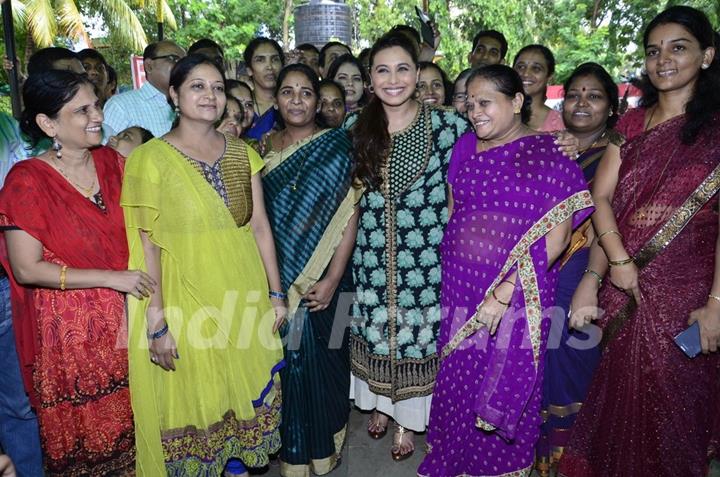 Rani Mukherjee poses with the Teachers at the Promotion of Mardaani at a Local School