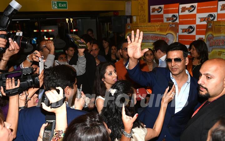 Akshay Kumar waves to the media at the Launch of World Kabaddi League in London