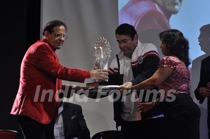 Randhir Kapoor felicitates a guest at the Launch of RK Medical Guide