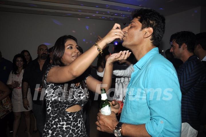 Melissa Pais feeding cake to a friend at her Birthday Bash