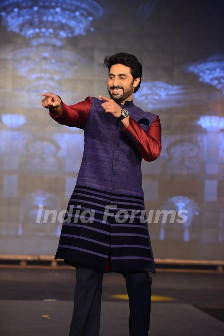 Abhishek Bachchan makes a funky pose while walking the ramp at Manish Malhotra's Show