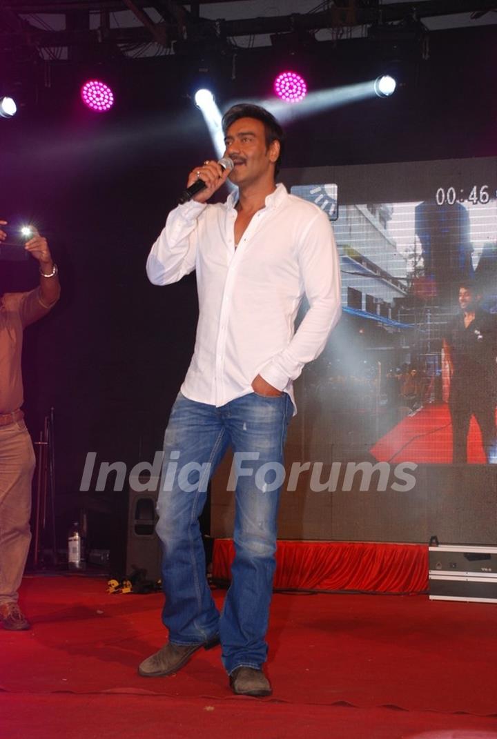 Ajay Devgn addresses the students at the Promotions of Singham Returns