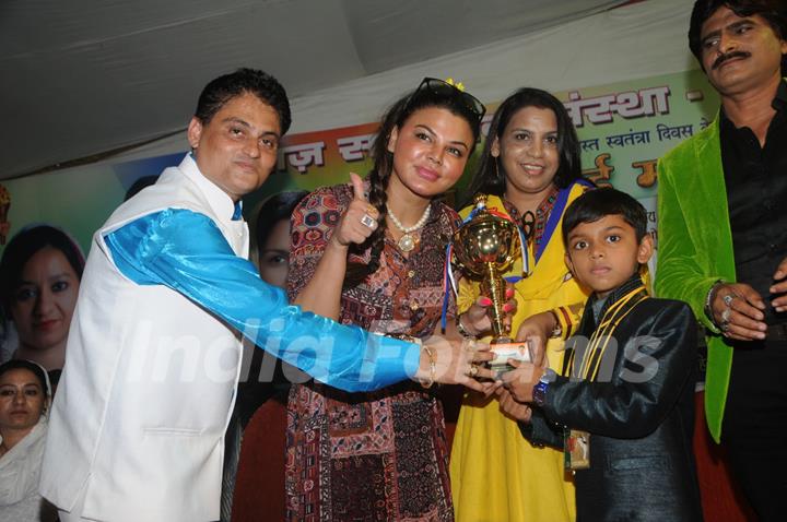 Rakhi Sawant felicitates a young achiever at the event