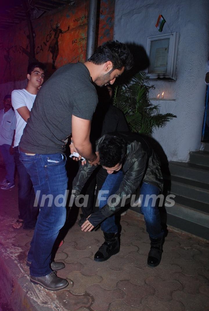 Varun Dhawan touches Arjun Kapoor's feet at the Wrap Up Party of Badlapur