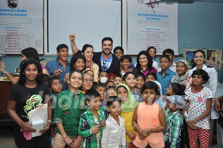 Zayed Khan poses with kids at Rouble Nagi's Art Workshop