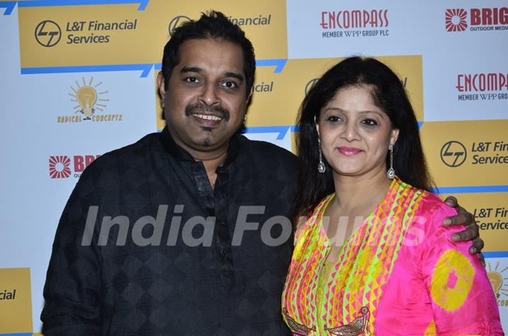 Shankar Mahadevan poses with wife at Shaan's Live Concert