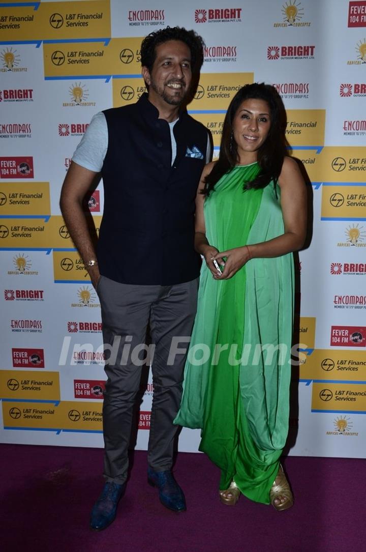 Sulaiman Merchant poses with wife at Shaan's Live Concert