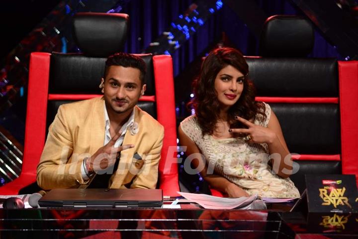 Yo Yo Honey Singh poses with Priyanka Chopra for the camera