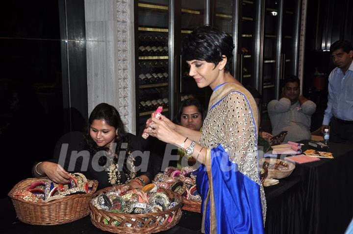 Mandira Bedi checks out designs at Araish Charity Exhibition