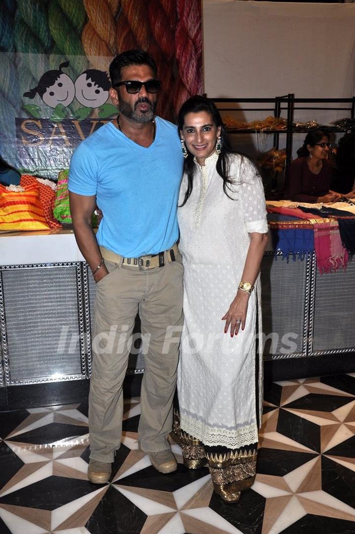 Suniel Shetty poses with Mana Shetty at Araish Charity Exhibition