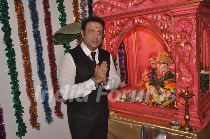 Govinda offering his prayers to Lord Ganesha