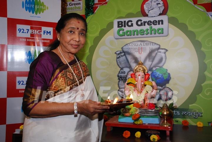 Asha Bhosle poses for the media at 92.7 Big FM Studio