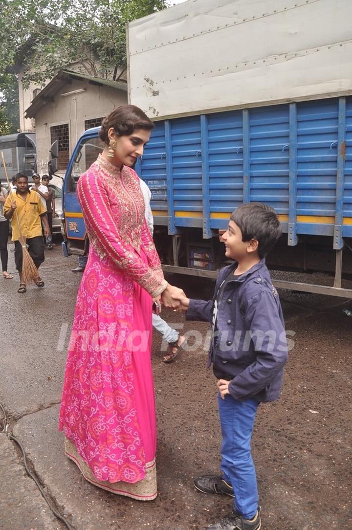 Sonam Kapoor greets a young fan at the Promotions of Khoobsurat