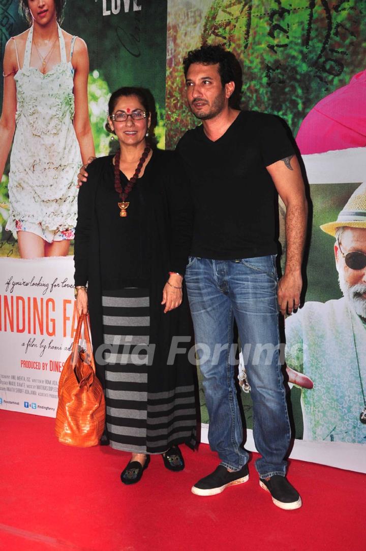 Dimple Kapadia and Homi Adajania pose for the media at the Special Screening for Finding Fanny