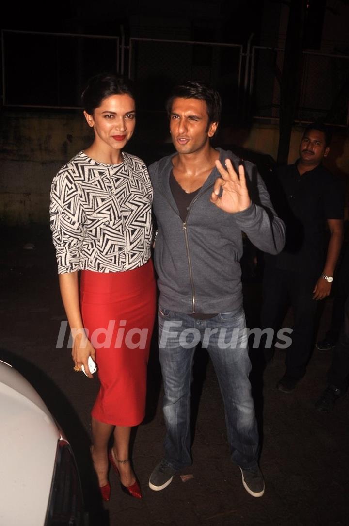 Ranveer Singh and Deepika Padukone pose for the media at the Screening of Finding Fanny