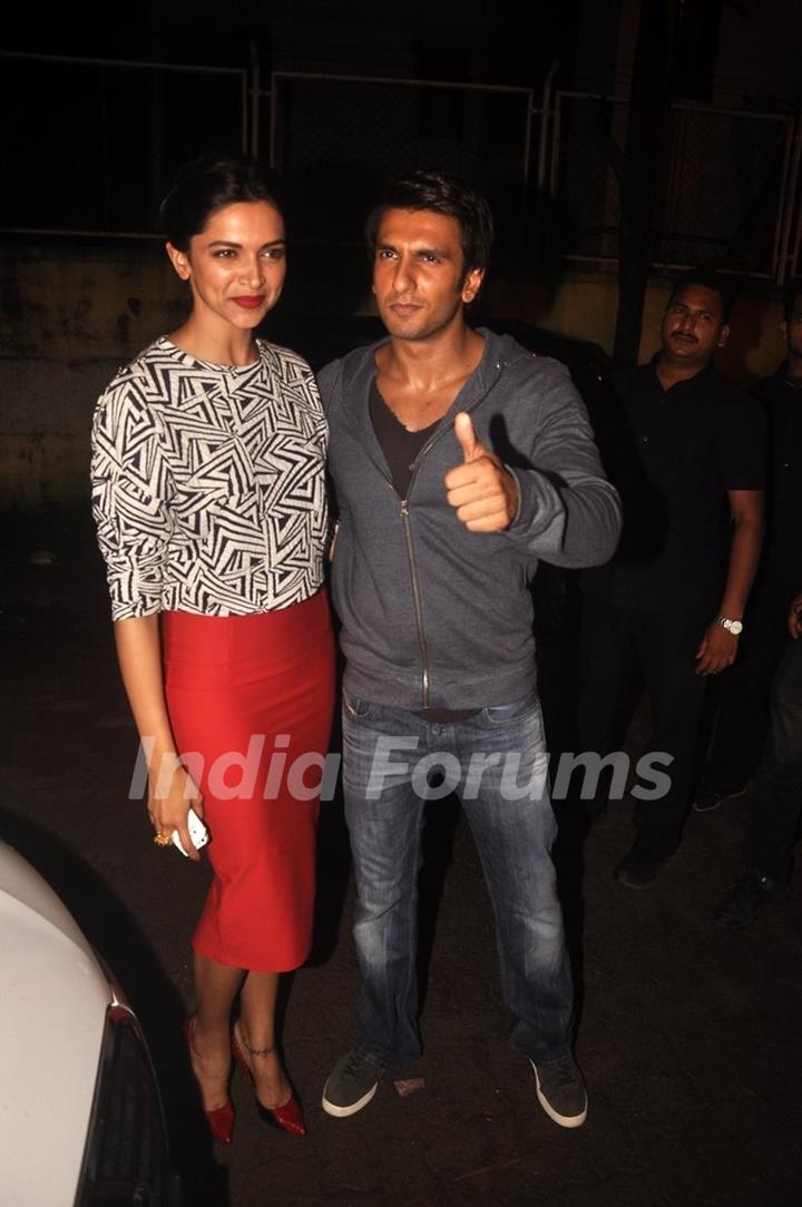 Ranveer Singh and Deepika Padukone pose for the media at the Screening of Finding Fanny