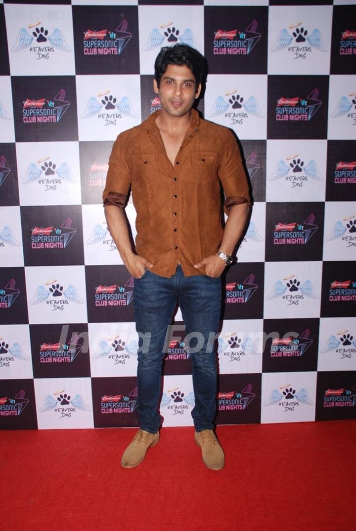 Siddharth Shukla poses for the media at the Launch of Heavens Dog Resturant