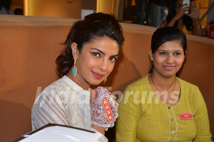 Priyanka Chopra sports a stitched hand gear at the Promotions of Mary Kom at Usha World