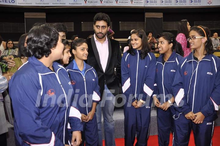 Abhishek Bachchan poses with participants at TT Championship