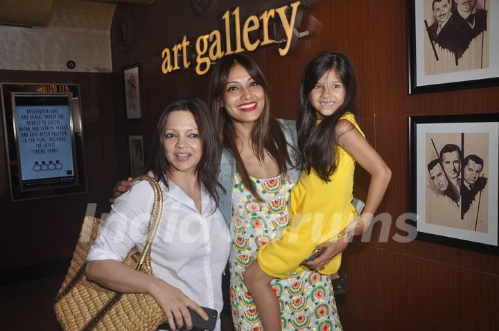 Bipasha Basu poses with a friend and a kid at the Special Screening of Creature 3D