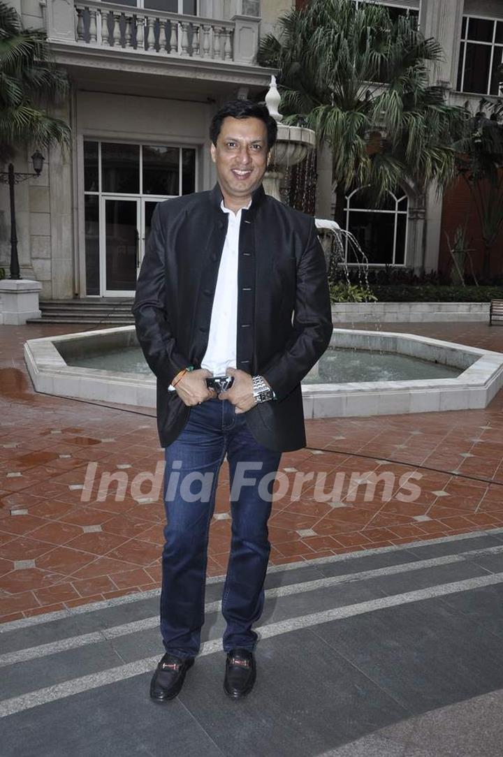 Madhur Bhandarkar poses for the media at Aaj Tak Panchayat Talk Show