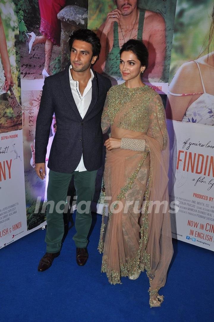 Ranveer Singh and Deepika Padukone pose for the media at the Success Bash of Finding Fanny