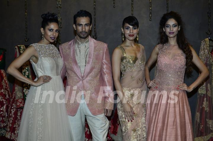 Models showcase the designs at the Store Launch of Shyamal Bhumika