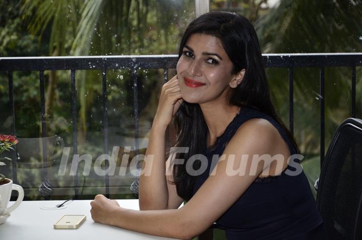 Nimrat Kaur gives a smiling pose for the camera at the Launch of Juice Magazine