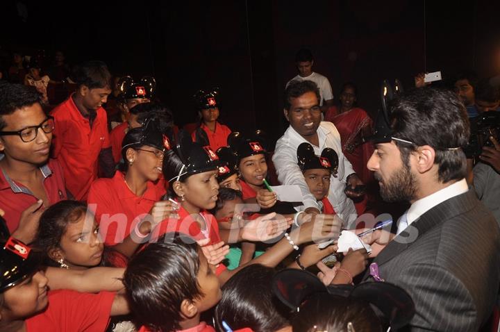 Fawad Khan signs autographs for young fans at the Special Screening of Khoobsurat for Kids