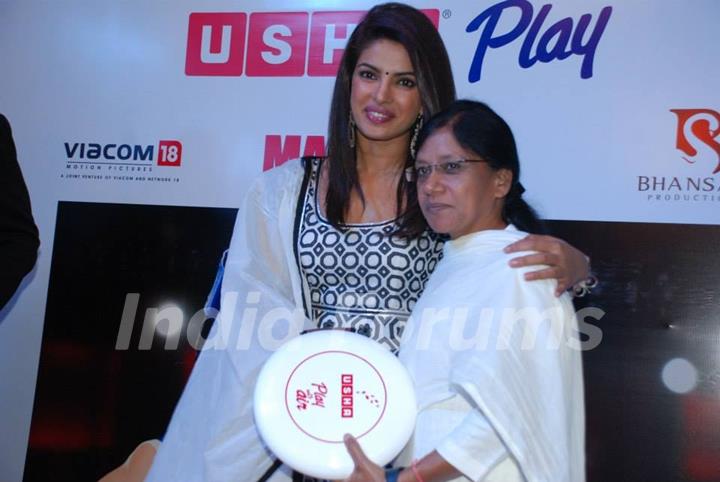 Priyanka Chopra poses with a fan at Usha Event