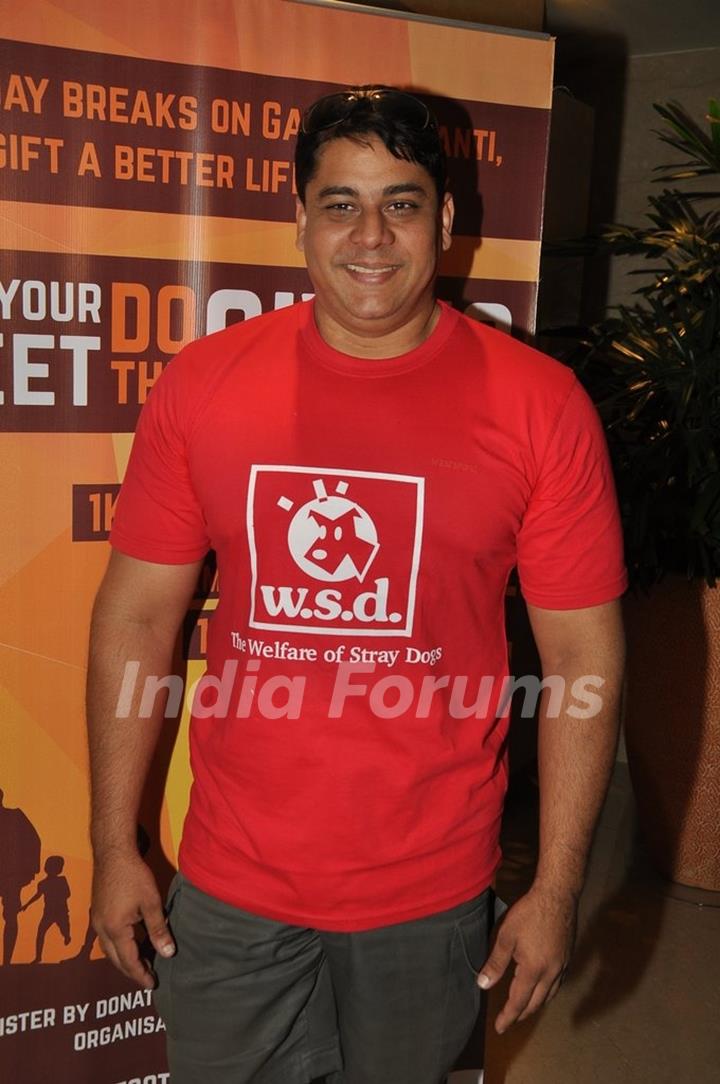 Cyrus Broacha poses for the media at Footsteps 4 Good Ngo Event