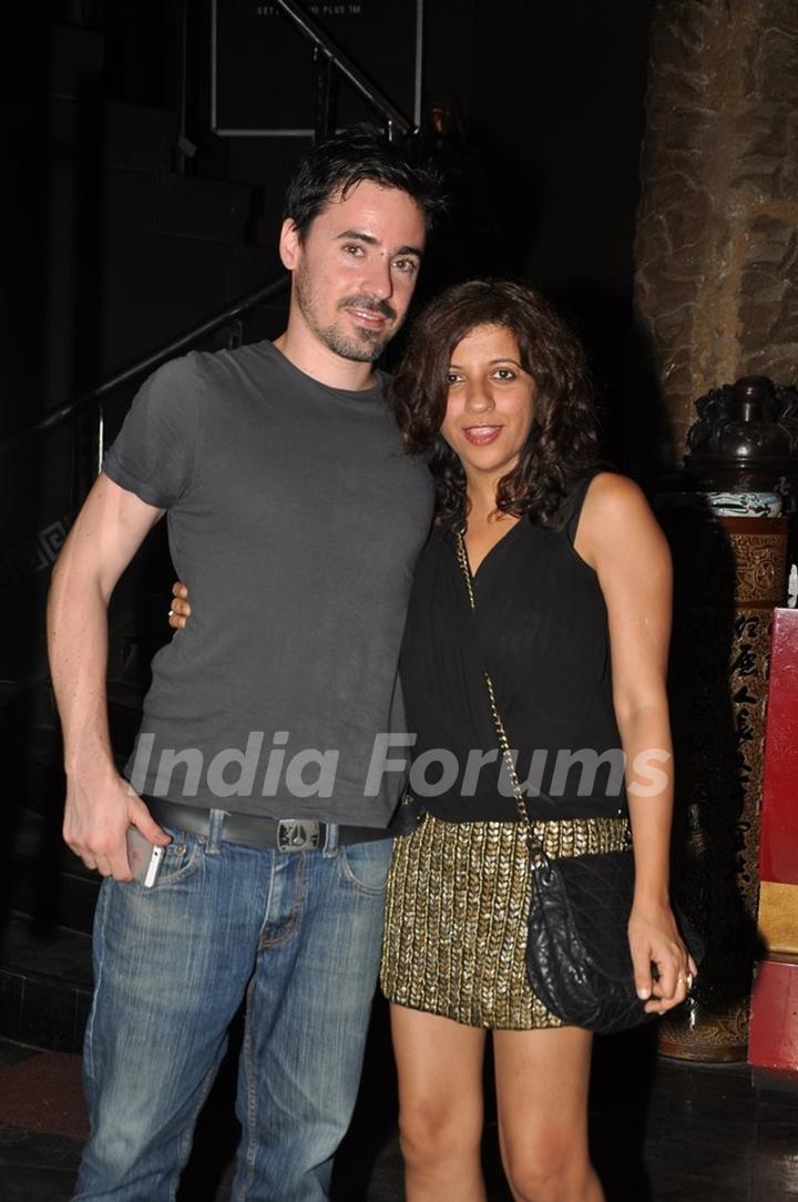 Zoya Akhtar poses with a friend at the Completion Bash of Dil Dhadakne Do