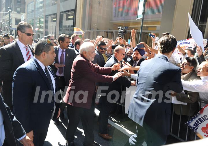 Narendra Modi greets the people at the United States of America