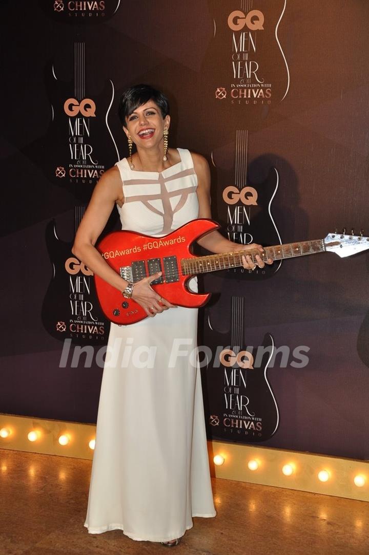 Mandira Bedi poses with a guitar at the GQ Men of the Year Awards