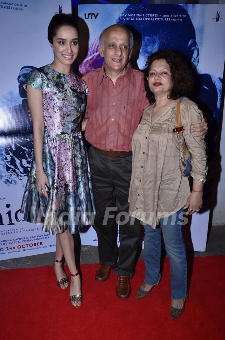 Shraddha Kapoor poses with Mukesh Bhatt and his wife at the Special screening of Haider
