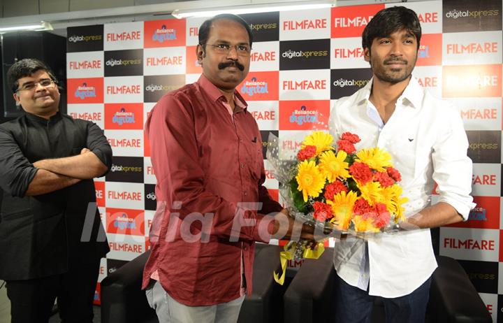 Dhanush felicitated at the Filmfare Readers Meet at the Reliance Digital Store