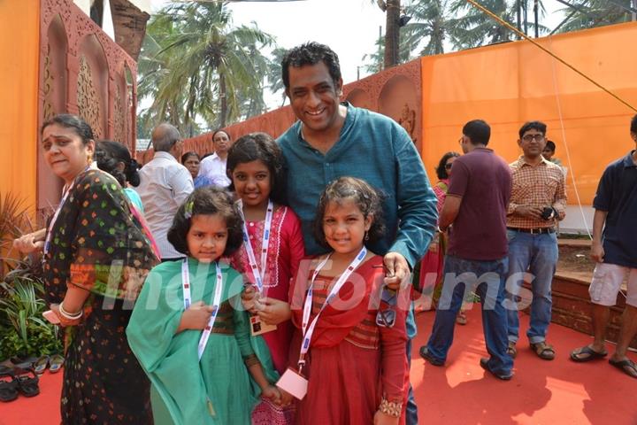 Anurag Basu poses with kids at North Bombay Sarbojanin Durga Puja