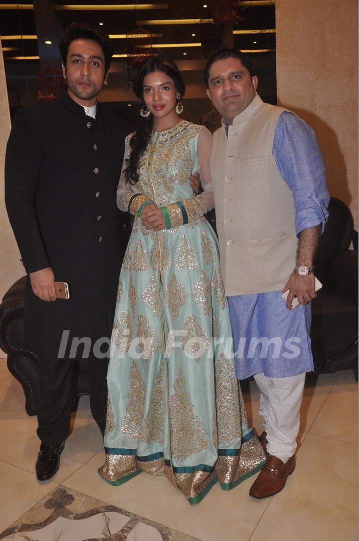 Adhyayan Suman poses with Sara Loren and a guest at the Annual Garba Celebrations