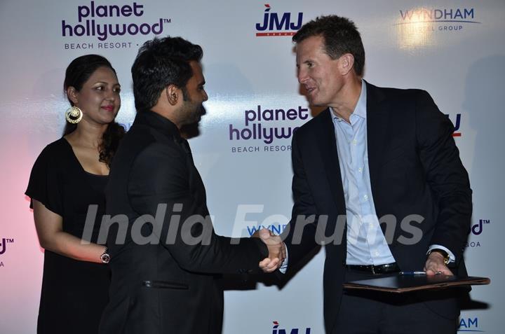 Sachin Joshi greets a delegate at the Launch of Planet Hollywood