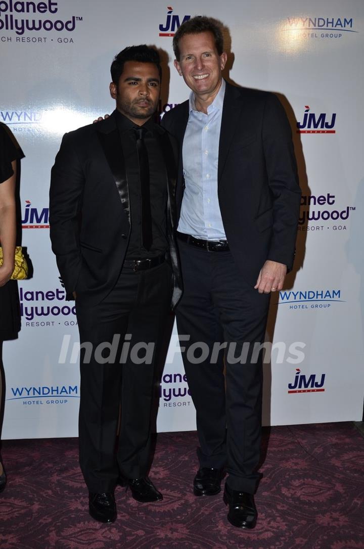 Sachin Joshi poses with a delegate at the Launch of Planet Hollywood