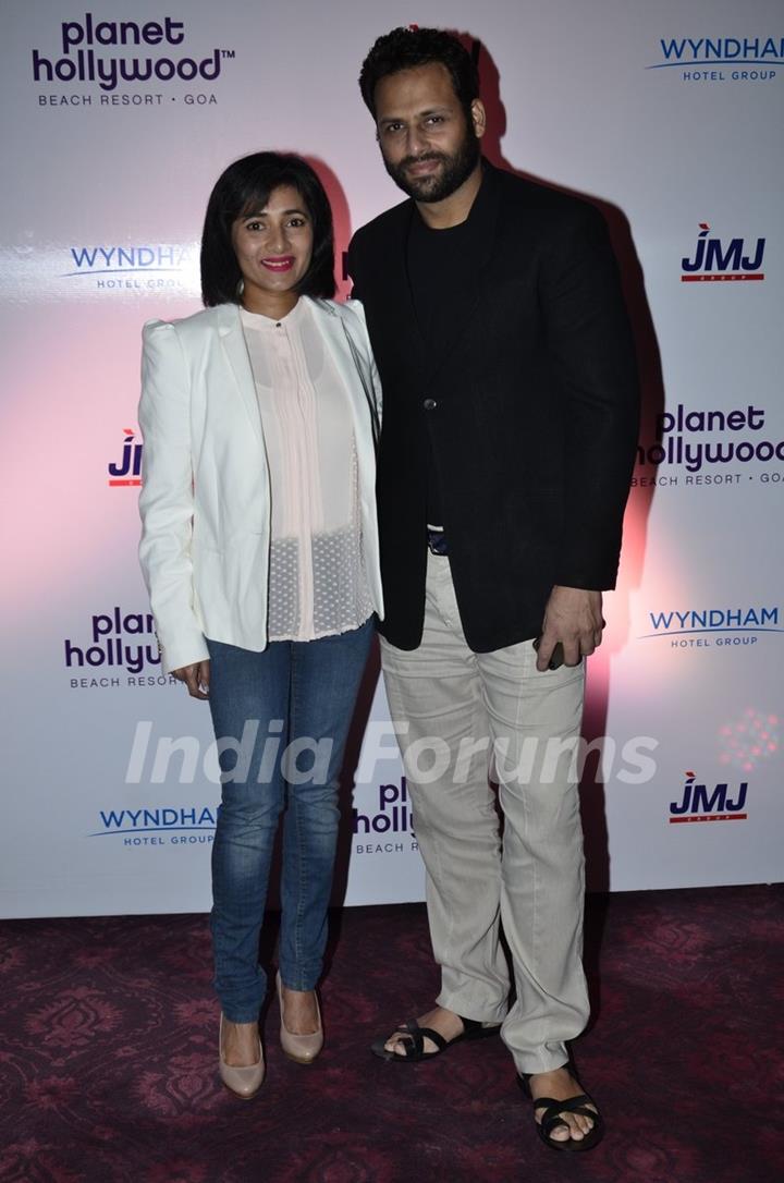 Bikram Saluja poses with wife at the Launch of Planet Hollywood