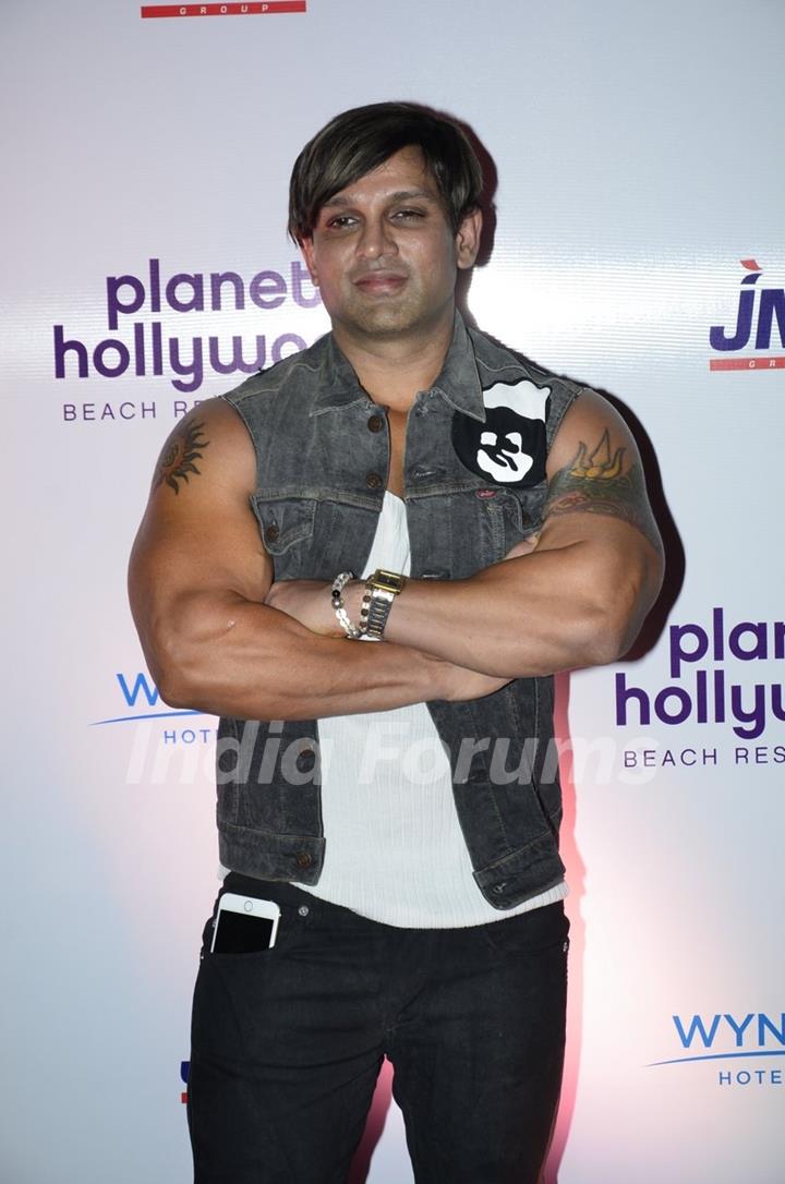 Yash Birla poses for the media at the Launch of Planet Hollywood