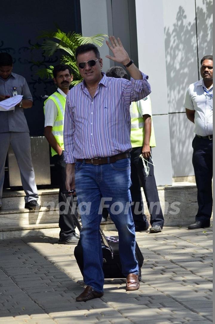 Boman Irani poses for the media at Airport while leaving for Ahmedabad