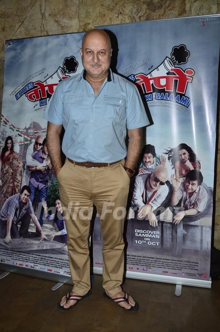 Anupam Kher poses for the media at the Special Screening of Ekkes Toppon Ki Salaami